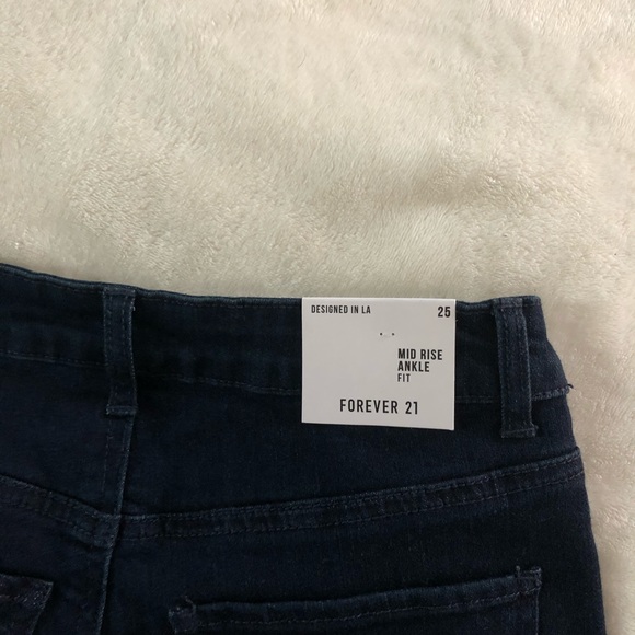 Navy skinny jeans with white lining - Picture 2 of 4